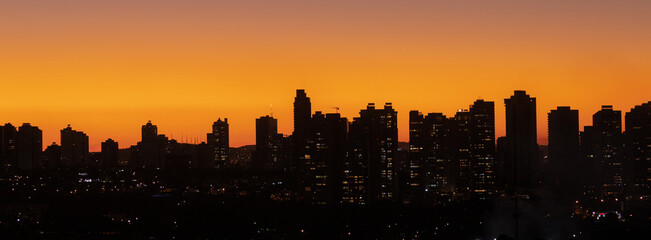 Skyline of the city during a sunset