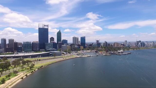 Beautiful drone shot flying towards Perth CBD in Western Australia on a gorgeous summers day, blue skies with few clouds.