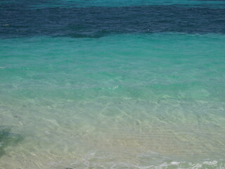 Fototapeta na wymiar turquoise water and blue water, gradation of the ocean