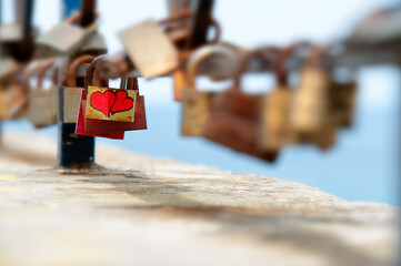 The padlocks of love in Peschici. Costa del Gargano. Italy Fortunately romantics still exist