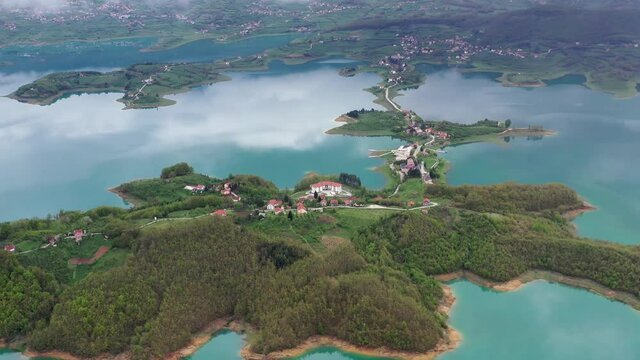 The idyllic Rama Lake turquoise waters, bays and islands. Aerial view