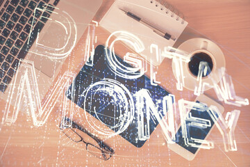 Double exposure of blockchain theme hologram over table with phone. Top view. Crypto technology concept.