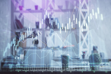 Double exposure of stock market graph drawing and office interior background. Concept of financial analysis.