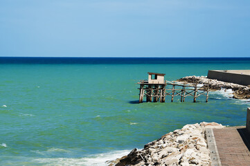 A traditional fishing machine of the city of Termoli, known as ancient Trabucco,very famous and...