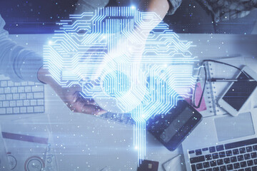 Double exposure of man and woman working together and human brain hologram drawing. Brainstorm...