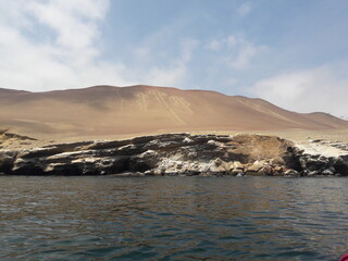 Paracas Peru carvings on side of mountain 2019