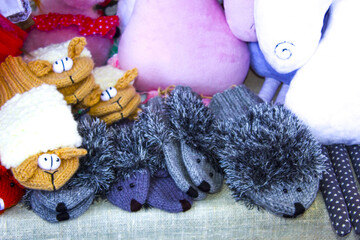 closeup handmade knitted toys gloves