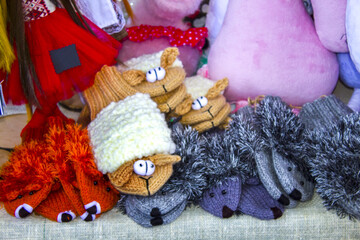 closeup handmade knitted toys gloves