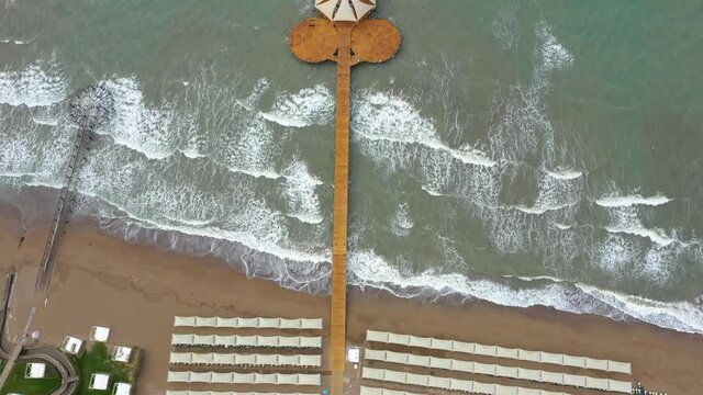 Aerial view of sea waves reaching sandy beach. Meditteranean sea. Turkey, Belek 