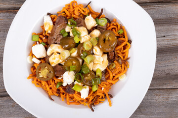 sweet potato steak poutine dish