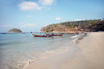 Traditional boats on the sea beach against the background of Islands, Andaman sea