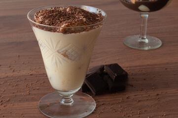tiramisu dessert on a wooden table