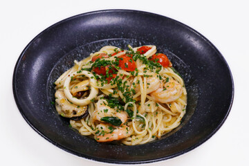 seafood linguine pasta with shrimps, mussels and squid. Italian food speciality.