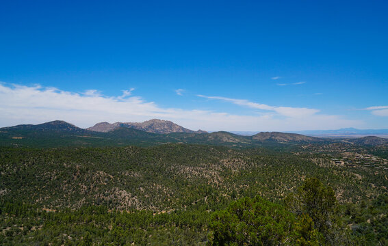 The views from the top of the trail on Prescott, Arizona's Thumb Butte. In the distance you can see Granite Mountain, and the San Francisco Peaks.