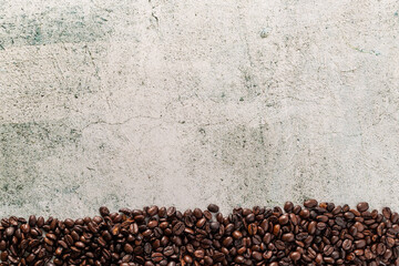 coffee beans on the ground with copy space