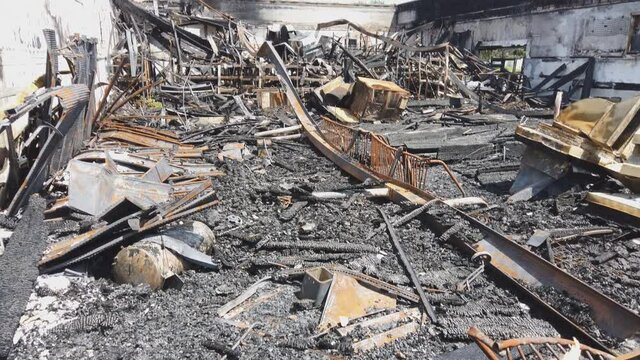 Minneapolis protest and riots turns violent interior of a burnt by fire building