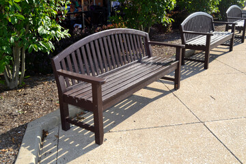 Fototapeta premium A Set of Benches Outside of a Restaurant