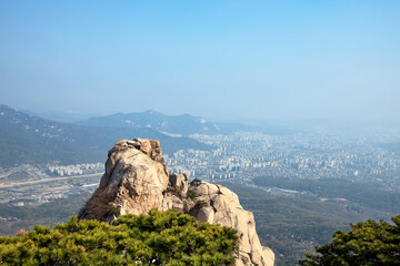 Fototapeta na wymiar View on Seoul from Jaunbong Peak in Bukhansan National Park, Korea