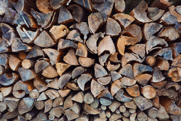 pile of wood log cut in piece for texture background