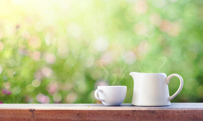 Tea cup set on the wooden table. nature background