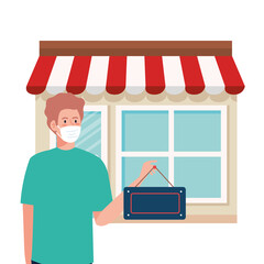 open again after quarantine, man with label of reopening of shop, we are open again, store shop facade