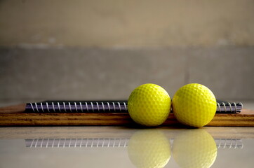 Golf Ball on a black background. Quarantine Photography. Abstract, Background wallpaper colourful.