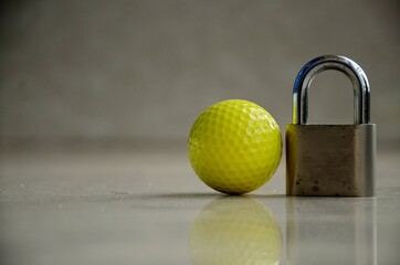 Golf Ball on a black background. Quarantine Photography. Abstract, Background wallpaper colourful.