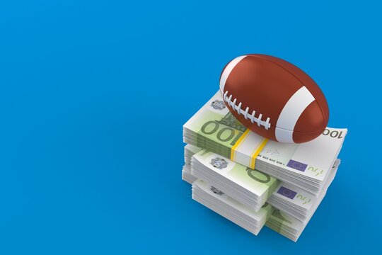 Rugby ball on stack of money