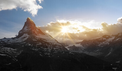 Matterhorn peak sunset photo on evening time with sunlight ray lens flare