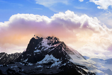 Matterhorn peak covering by cloud on evening with sunset vanilla sky