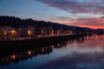 Amazing red sunset and Rhone river in Vienne, France