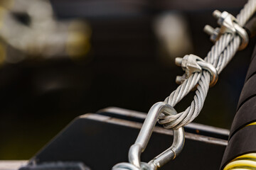 Snap hook and steel rope, machine detail