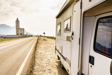 Caravan and church San Miguel, Cabo de Gata, Spain