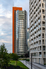 Obraz na płótnie Canvas Business Skyscaper Vienna - Andromeda Tower. The Vienna International Center is a Complex with tall skyscrapers and high rise (corporate and residential) buildings next to the Danube River. 