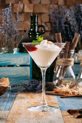 Sweet cherry jam dessert with cream martini glass