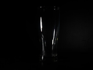 Empty  glass isolated on black background