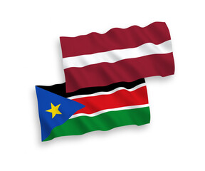 Flags of Latvia and Republic of South Sudan on a white background