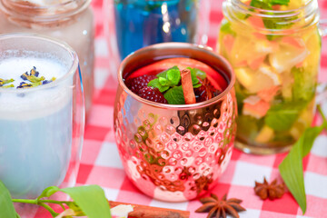 Unique and stylish cups of coffee and tea. Mix cocktails. Butterfly pea blue tea, mulled wine, fruit tea, latte coffee.