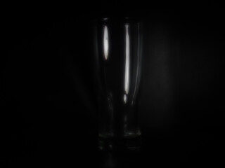 Empty  glass isolated on black background