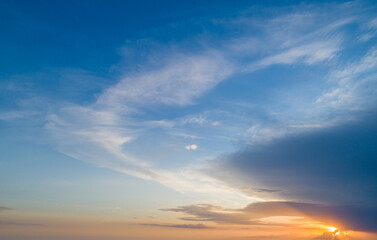 Naklejka na ściany i meble Sunset sky with multicolor clouds