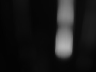 Black blur abstract backgroundwith white lights