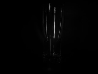 Empty  glass isolated on black background