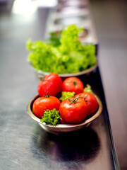 Tomatoes in a plate on the table