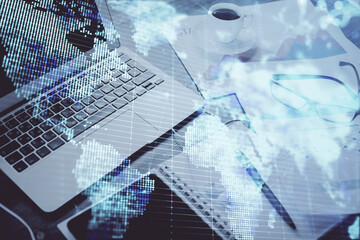 Double exposure of business theme icons and work space with computer background. Concept of success.