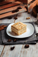 Cake made of thin crispy cakes and cream napoleon
