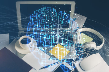 Double exposure of desktop computer and human brain drawing hologram. Ai concept.