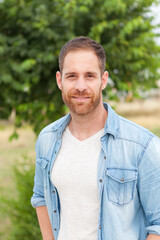 Casual guy relaxed in a park