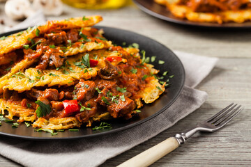 Hungarian potato pancake with goulash