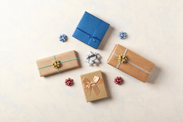 Gift Wrapping. A bright background with packaging accessories and gifts. Creative composition....