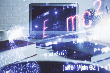 Desktop computer background and formula hologram writing. Double exposure. Education concept.